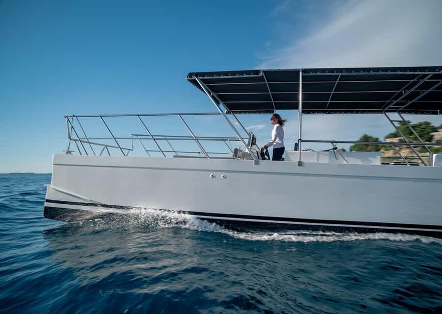 Rovinj: Sunset & dolphin group tours with Catamaran - Cruising past Rovinj from the sea