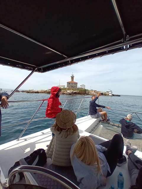 Rovinj: Sunset & dolphin group tours with Catamaran - Snacks, timing, and the evening rhythm
