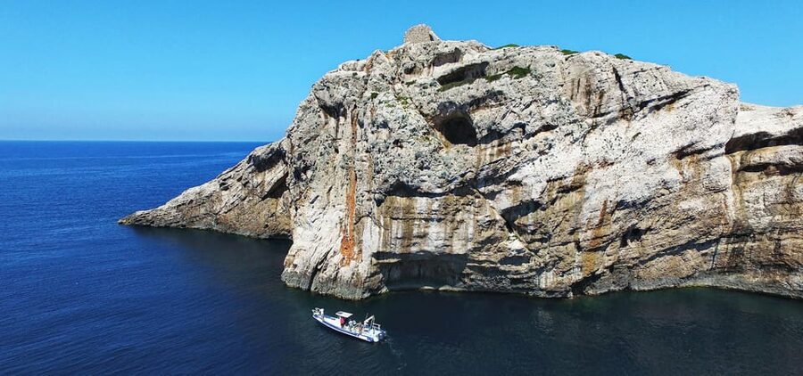 Sibenik: Full-Day Kornati National Park Boat Tour - The first island stop: swim, snorkel, or cliff dive