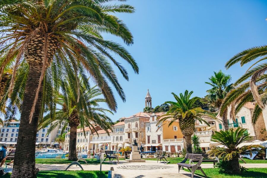 Split: Blue Cave, Vis & Hvar Full-Day Trip by Speedboat - Stiniva Cove, cliffs around a small beach