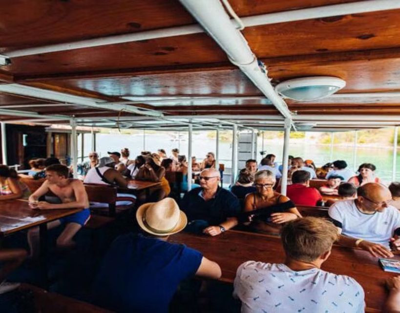 Split: Blue Lagoon Boat Trip with Lunch, Wine and Snorkeling - Snorkeling, swimming, and the boat’s extra features