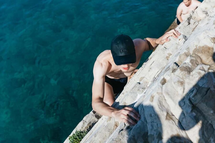 Split: Cliff Jumping & Deep Water Solo Tour - Climbing above Kasjuni Beach
