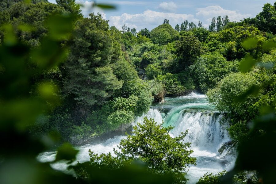 Split: Krka National Park Day Trip with Boat Ride & Swimming - Skradin, a short walk and a clear-water swim