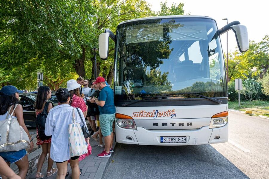 Split: Krka Waterfalls Guided Day Trip with Swim & Boat Tour - Walking beside Krka’s waterfalls