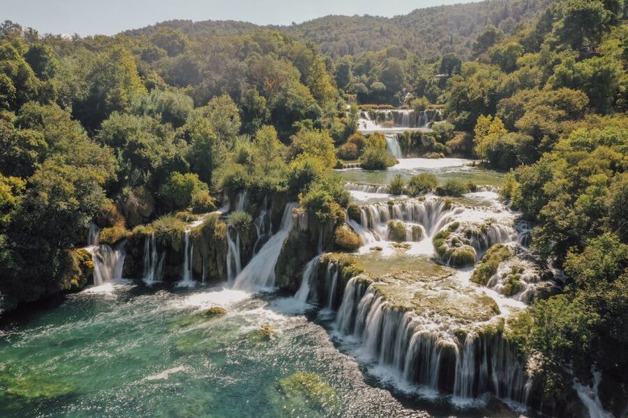 Split: Krka Waterfalls Tour, Boat Cruise, and Swimming - The panoramic boat ride toward Skradin