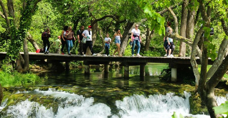 Split: Krka Waterfalls With Boat Cruise, Wine and Olive Oil - The wooden paths around Skradinski buk