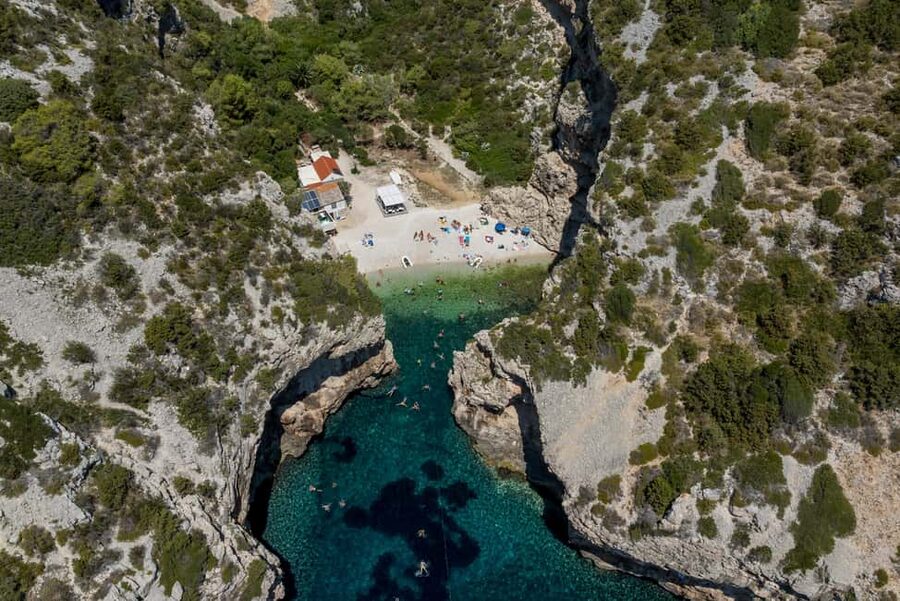 Split or Trogir: Blue Cave, Vis, and Hvar Speedboat Tour - Stiniva Cove, seen from the water