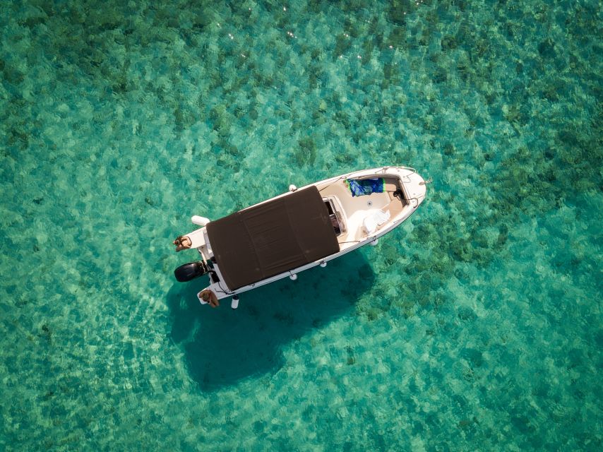 Split: Private Full Day Boat Trip to Blue Lagoon and Trogir - Maslinica shows a quieter side of island life