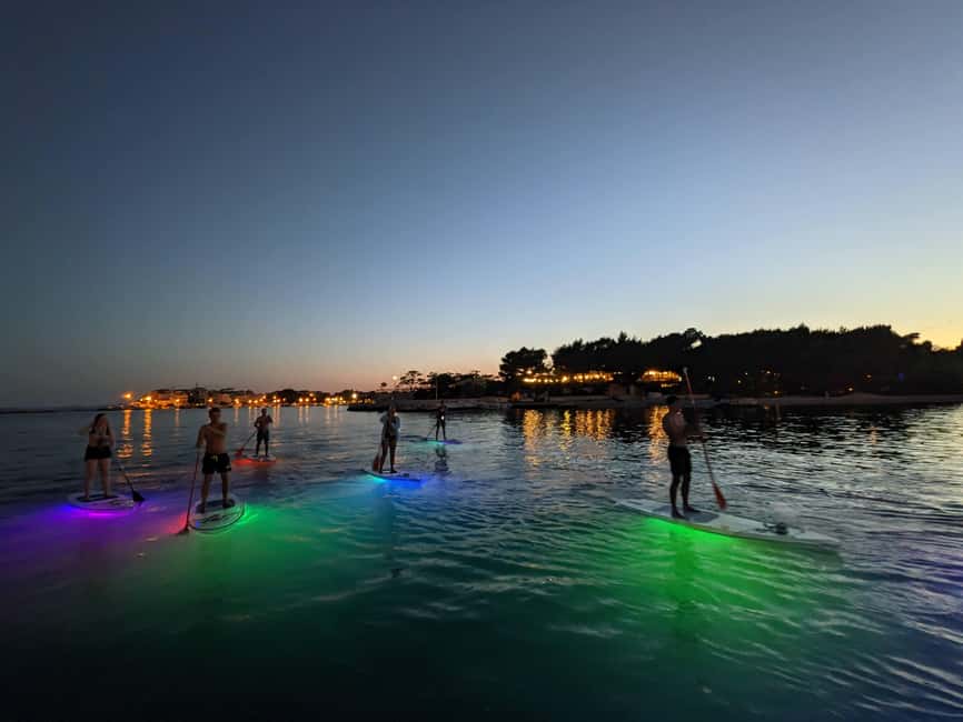 Split: Transparent SUP night Glow tour - Guide style and group comfort