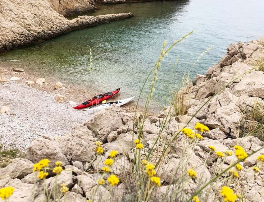 Water activity, kayak tours with a guide, cliff jumping - Beach time, refreshments, and the end of the route