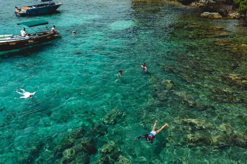 Zadar: 3 Islands Snorkeling Cruise with Prosecco - Prosecco, fruit, and a friendly crew