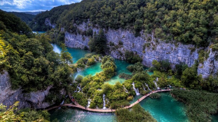 Zadar: Plitvice Lakes Guided Day Tour with Tickets - The boat ride across turquoise water