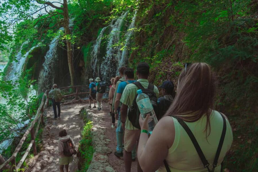 Zadar: Plitvice Lakes Guided Day Tour with Tickets - The electric train and a more relaxed finish