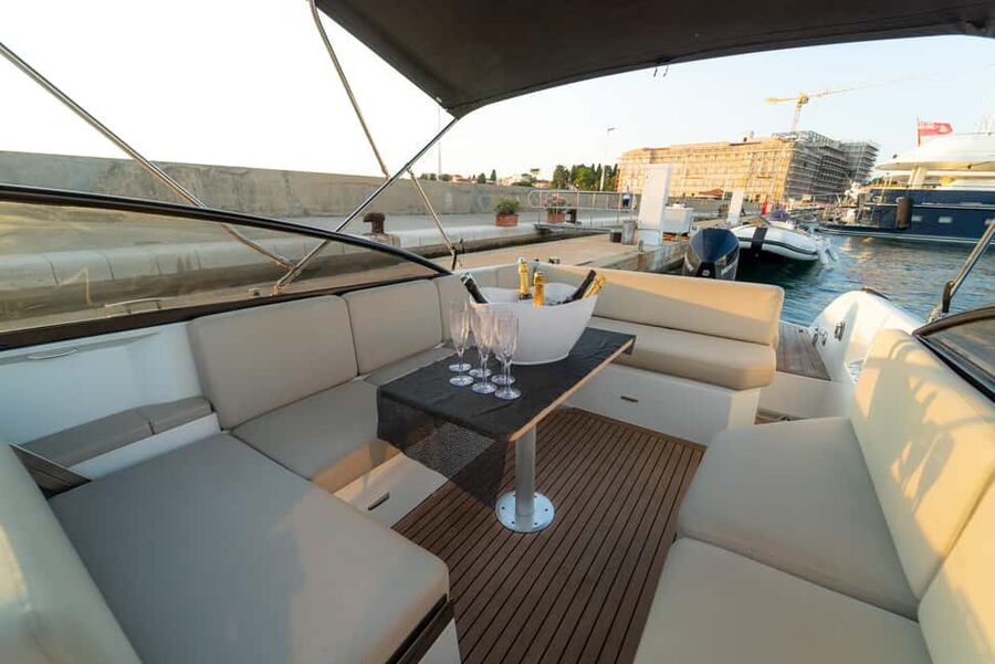 Zadar: Sunset & Nighttime Cruise with Sparkling Wine - Leaving Marina Tankerkomerc as daylight fades