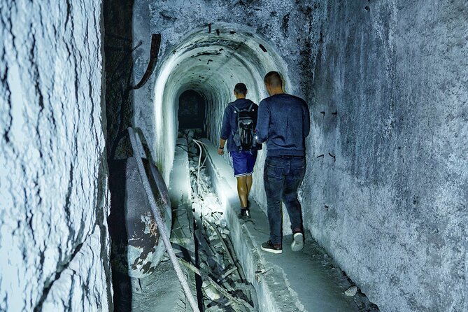 Zeljava Airbase: History and Adventure Tour/Plitvice - Entering the tunnels with a flashlight